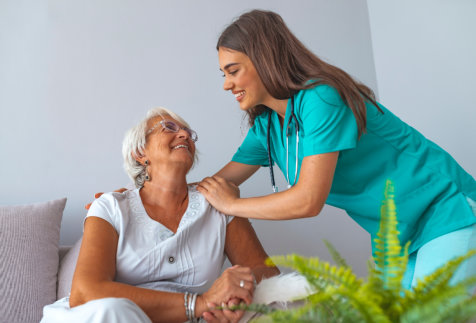 Elderly with a caregiver